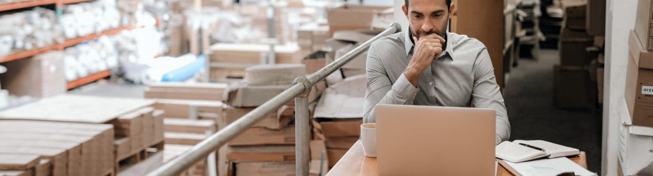Manager working online while sitting in a warehouse office Types of business structures