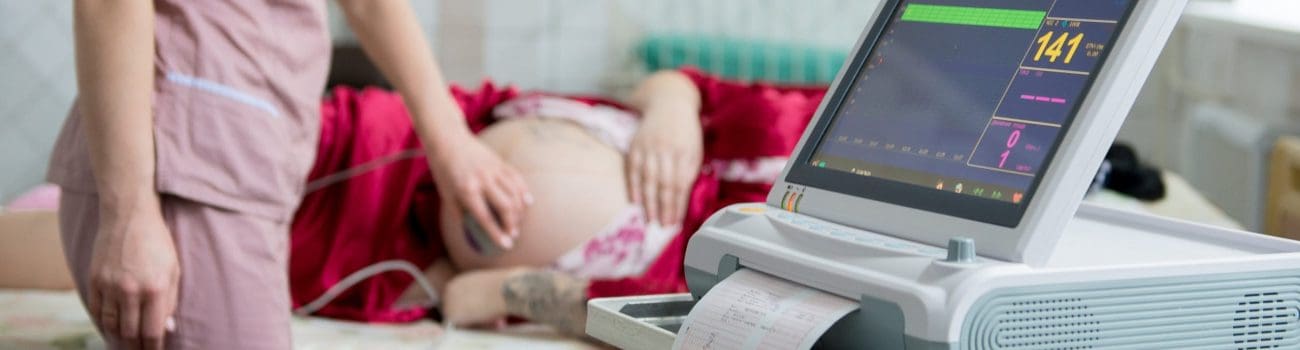 Midwife monitoring pregnant women Midwife monitoring pregnant women