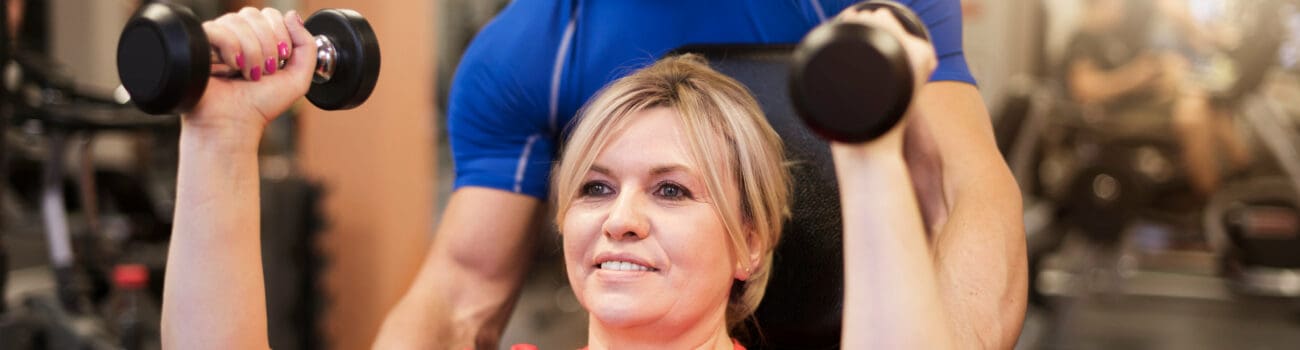 Personal trainer and client Personal trainer and client