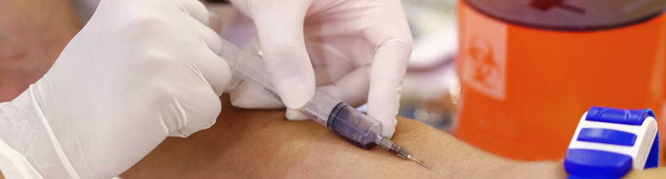healthcare professional drawing blood healthcare professional drawing blood