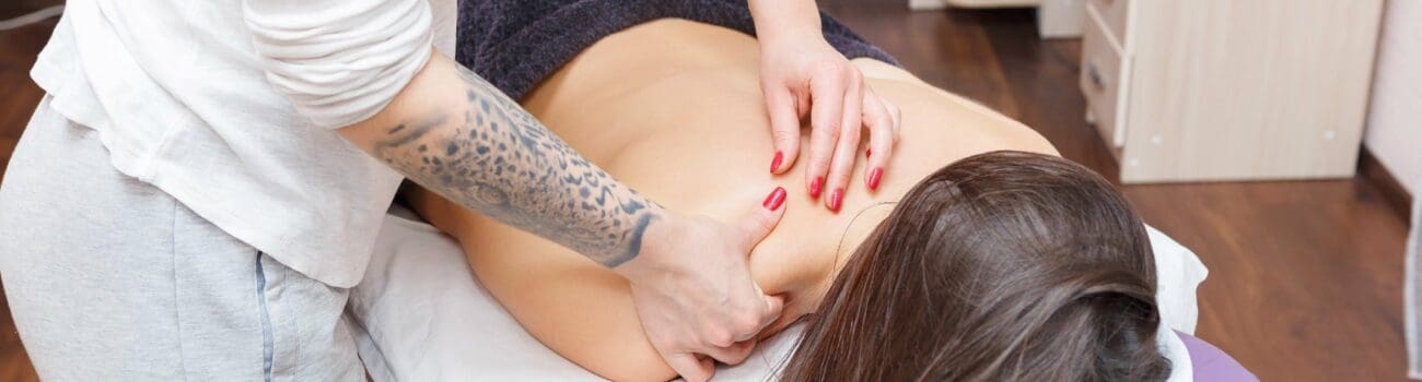 Massage Therapist during training
