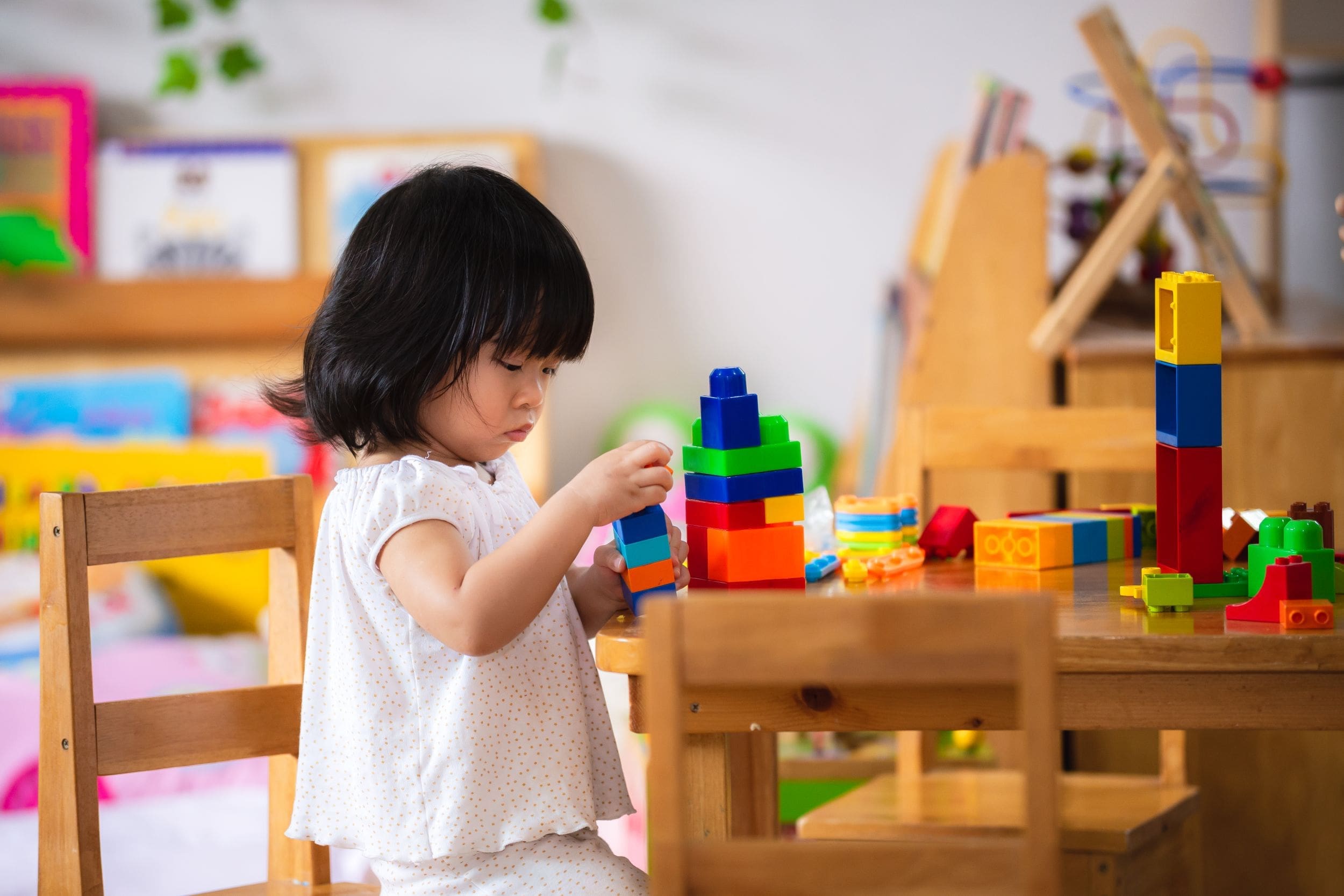 Reduced social interaction and playful “pretend” speech Reduced social interaction and playful “pretend” speech